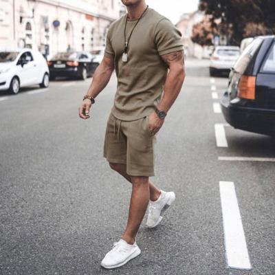 China Antibacterial Men's Tracksuit 2 Pieces Set Summer Sport Solid Hawaiian Suit Short Sleeve T-Shirt And Shorts Fashion Man Casual Clothing for sale