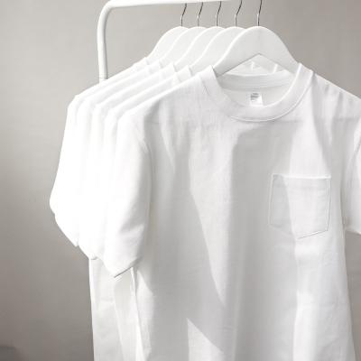 China Compressed Pure White Cotton T-Shirt 270g Heavy Weight Men Round Neck T-Shirt With Chest Pocket for sale