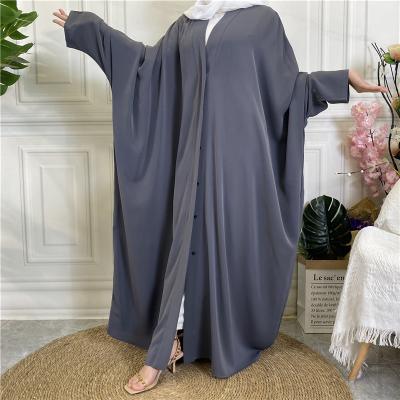 China Muslim Women Prayer Clothing Muslim Eid Button Open Abaya Dubai Butterfly Turkish Kaftan Islamic Clothing Kimono Front Open Nida Abaya With Side Pockets for sale