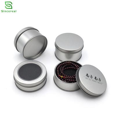 China Food Grade Wholesale 60ml/2oz Window Clear Lid Silver Metal Container Around Flat Tin Can For Small Metal for sale