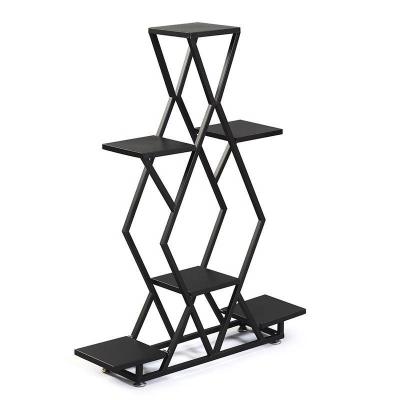 China Multi-layer wrought iron flower pot hanger balcony style flower shelf storage Nordic minimalist indoor living room rack for sale