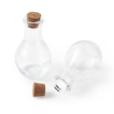 China Viable Clear 2pcs Bulb Shape Glass Bottle For Bead Containers With Pads For Jewelry Packaging for sale