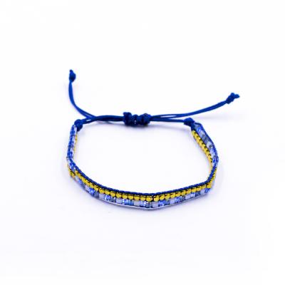 China Hot Selling Fashionable Products Gold Copper Bead With Dark Blue Square Crystal Bead Braided Waxed Rope Miyuki Adjustable Bracelet for sale