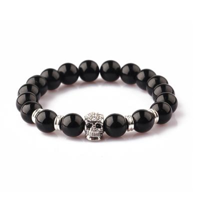 China Fashion CLASSIC Lava Shimmer Stone White Bead Bangle Plated Gold Skull Bracelet For Men for sale