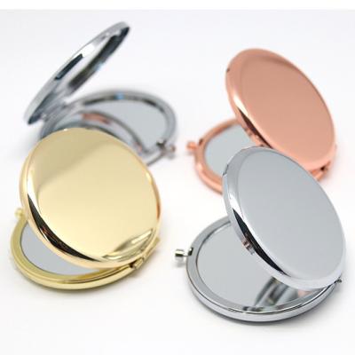 China Personalized Custom Portable Metal Makeup Mirror Stainless Steel Double Sided Round Mirror for sale