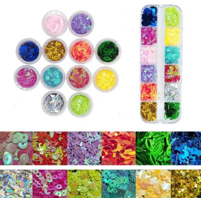 China Nail Art Wholesale 12 Grids Nail Art Mixed Color Laser Glitter Bling Special Shaped White Loose Sequins for sale