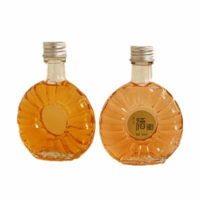 China 100ml Alcohol Glass Bottle Transparent Flat Alcohol Bottle For Brandy for sale