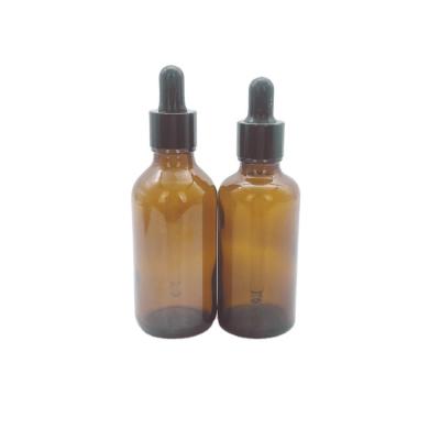 China 50ml 60ml Cosmetic Amber Color Plant Essential Oil Dropper Glass Bottle for sale