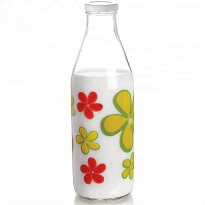 China Beverage Food Grade 1 Liter 1000ml Glass Milk Bottles With Sealed Metal Lid for sale