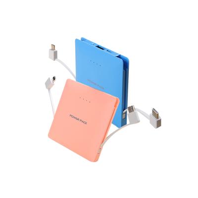 China Super Slim Portable Mini Built In Data Cable Fast Charging Power Bank For All Cell Phones With Type C for sale