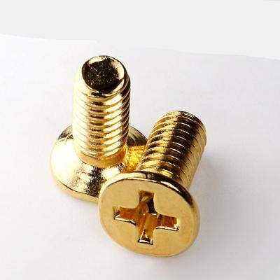 China Plating steel alloy flat countersunk titanium screw bolt gold color phillips head screw flat gasket for sale