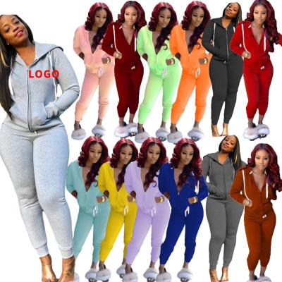 China Breathable Women Sweatsuit Set Zipper Solid Color Hooded Women Two Piece Fly Long Sleeve Sweatsuit Set Women Jogging Suit Set for sale