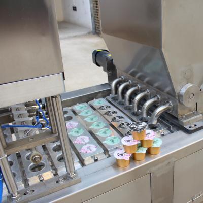 China Fully Automatic Integrated Beverage Servo Driven Coffee Capsule Granule And Drilling Dry Powder Filling And Sealing Machine for sale