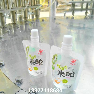 China Stand-up Spouted Pouch Beverage Juice Filling And Capping Packing Machine For Cap Screw Pouch for sale