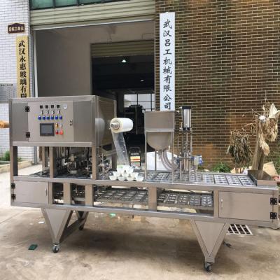 China Automatic beancurd oatmeal soup jelly cream bowl filling film food roll sealing machine for sale