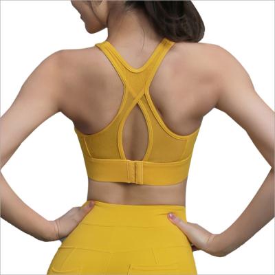 China Showmelly Breathable Chemical Fiber Blends 90% Solid Color U-Neck Sports Bra Women's Yoga Tops Tie Backless for sale