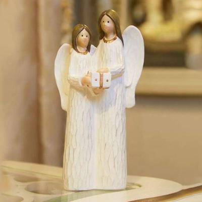 China Europe Polyresin Home Decor Angel Sisters Holding A Gift Box Friendship Wood Cut Out Angel Figurines for sale