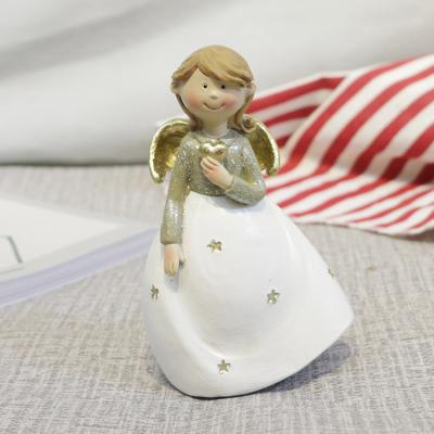 China Europe Christmas Gifts Promotional Handcrafted Crafts Golden Resin Wings Angel Figurine Cute Decoration for sale