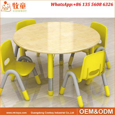 China Day Care Centre High Quality 4 Seats Round Wood Table and Plastic Chairs for 2-5 years old kids for sale