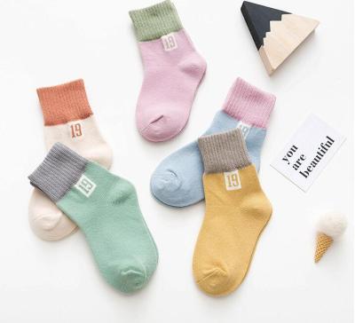 China OEM QUICK DRY Cheap Wholesale Designer Custom Design Your Own Logo Mens Crew Cotton Sports Baby Kid Custom Socks for sale