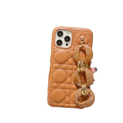 China Custom High Quality Luxury Anti-drop Cell Phone Cases Portable Cute Phone Cases For Iphone 13 Pro Max Phone Case With Hand Strap for sale