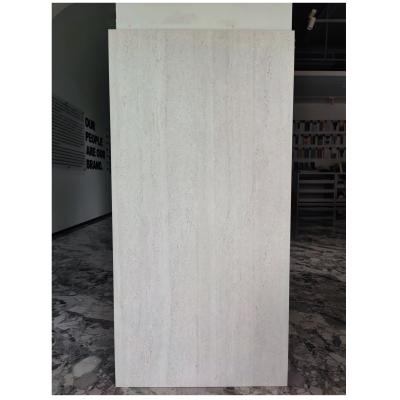 China 600*1200 White Travertine Floor Tiles Perfect for Living Room Shower Transformation for sale