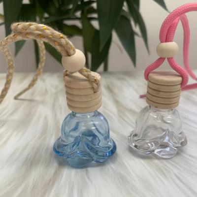 China Aromatherapy Personal Care Car Glass Bottle Christmas Hanging Decorations Cars Pendants Cars Accessories Manufacturers for sale