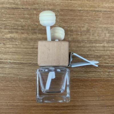 China Personal Care Car Perfume Gifts 5ml/10ml Square Lid Air Freshener Car Diffuser Vent Clip Bottle Wooden for sale