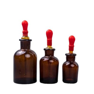 China Household Products Frosted Glass Mouth Stopper Lab Brown 30ml 60ml 125ml Wide Glass With Drop Reagent Bottle for sale