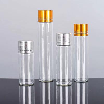 China Small Gasoline Borosilicate Tube Glass Mini Test Bottle With Cork And Aluminum Screw Cap for sale