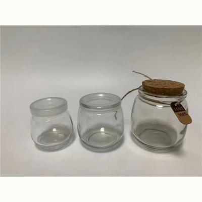 China Factory price viable direct bottle milk glass pudding jar with cork for sale