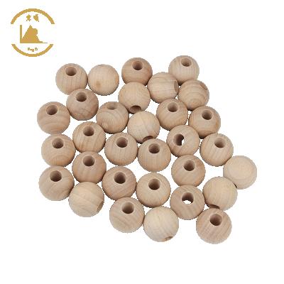 China Wooden Balls For Decoration Factory Direct Beech Round Wooden Loose Beads For DIY Craft Making Finished Wooden Ball With Big Hole Custom Size for sale