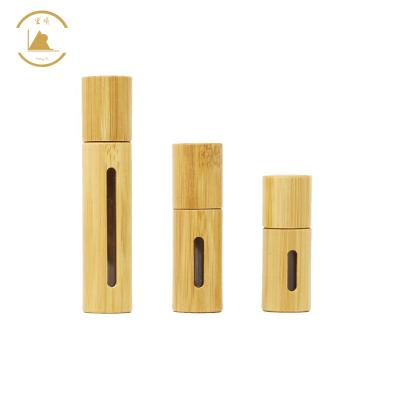 China Gift & Craft 10ml Bamboo Roll On Bottle For Essential Oils Clear Glass Inner With Natural Bamboo Wooden Shell for sale