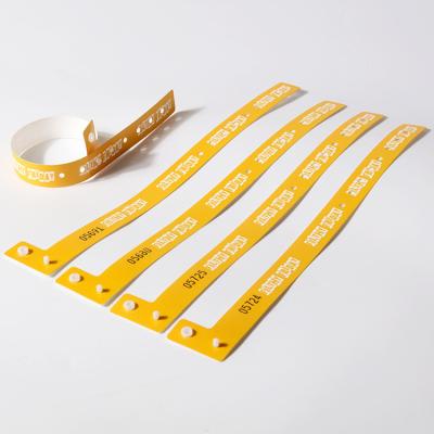 China Lightweight Cheap Wholesale Custom Design Wristbands Plastic Vinyl Wristband Party Wristband For Events for sale