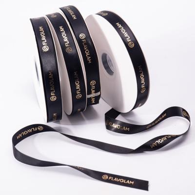 China High Tenacity Guangdong Custom Ribbons 20mm Custom Black Satin Ribbon With Gold Foil Printed for sale