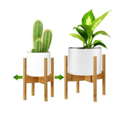 China Modern Indoor Bamboo Plant Stand Flower Pot Holder Width Adjustable Bamboo Potted Rack Stand Durable Planter Material for sale