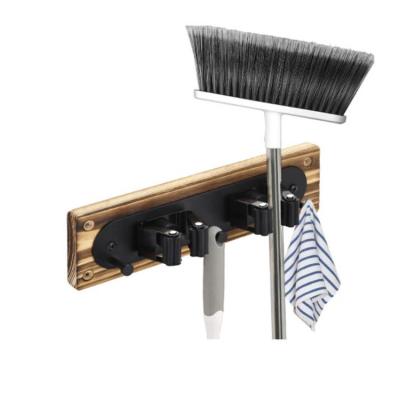 China Metal Viable Wall Mounted Burnt Broom and Broom Rack Holder with Staples Tools Cabinet Wooden Cleaning Organizer for sale