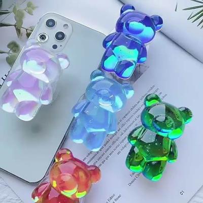 China Custom Resin Logo Adjustable 3D Crystal Bear Mobile Phone Holder Transparent Eject Handle Teddy Phone Socket Phone Holder for sale