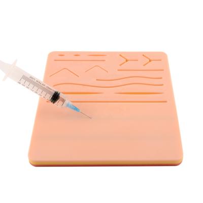 China 2 in 1 Customized 2 in 1 Medical Silicone Training Pad 3 Layer Suture Veins IV Pad 2 Injection Pad for sale