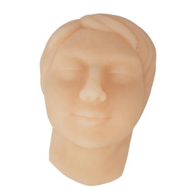 China Soft PVC Silicone Female Head Face With Bone Skin Suture Practice Model for sale