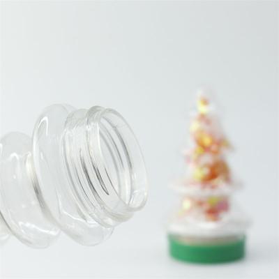 China Decoration Food Grade Christmas Tree Shape Pet Plastic Bottle For Christmas Candy Decoration for sale