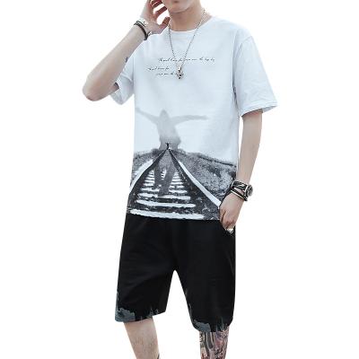 China QUICK DRY Men's T-shirt Summer New Ice Silk Suit Fashion Feel Short Sleeved Loose Half Sleeved Tops Clothing Mens Shorts Sets for sale