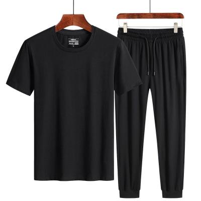 China 2021 New Spring/Summer QUICK DRY Men Round Collar Solid Color Shorts Sleeve Cotton Pieces Two T-shirt Pants Suit Plus Size Man's T-shirt for sale