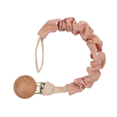 China BPA Free Customized Monochrome Stylish Toy Cotton Rope Baby Soother Clips for sale