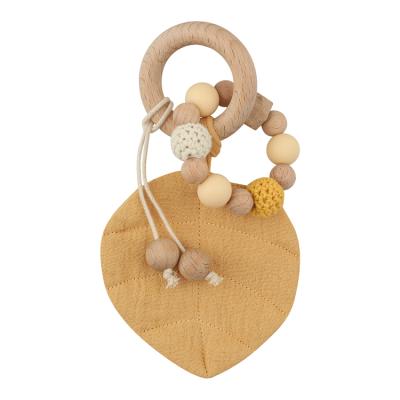 China BPA Free Baby BPA Free Cotton Leaves Teethers Beech Wooden Weave Beads Ring Baby Teethering Toy Teethers for sale