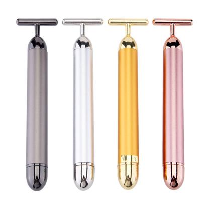 China Facial New Launched Vibrating Beauty T-Shaped Stick Products Gold Eye Massager Touch Beauty for sale