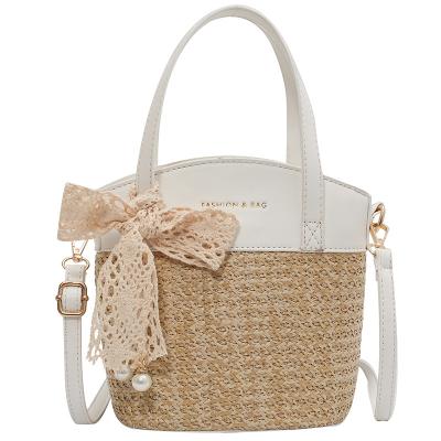 China High Quality Straw Woven Crossbody Bag Cute Barrel Shaped Pearl Decorate Cross - Body Bag for sale