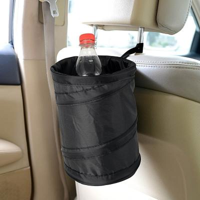 China Portable Universal General Multi Pocket Hanging Black Oxford Cloth Car Back Seat Organizer Bag for sale