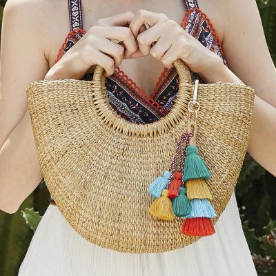 China Bohemia factory price cotton tassel purse rainbow keychains women's handmade bohemian handbag charm wholesale for sale