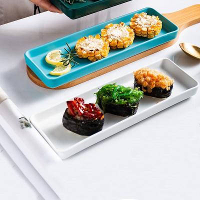 China Custom Viable Green Black White Ceramic Rectangle Rolling Tray Gloss Color Ceramic Sushi Dish for sale